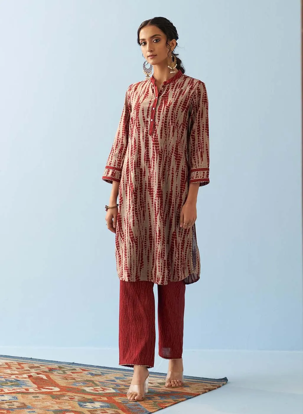 Maroon Printed Kurta Set with Mandarin Collar and Broad Border Sleeves